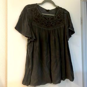 Purposefully faded black torrid blouse